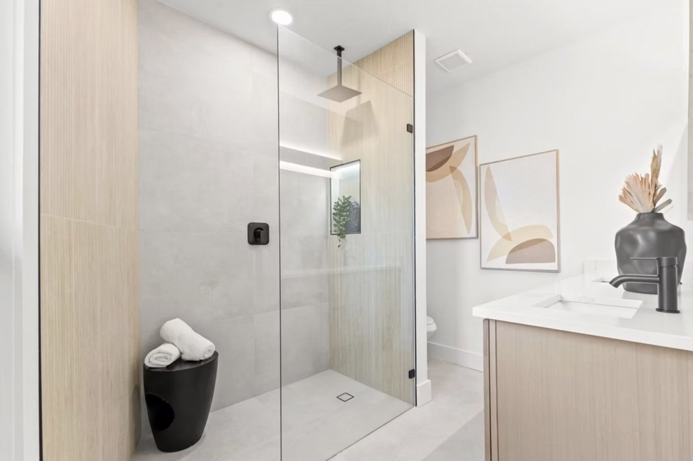 St. Petersburg spa bath with oak vanity and glass shower
